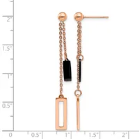 A pair of rose gold drop earrings with ball studs, delicate chains, a black rectangular stone on one side, and geometric rectangular cutout pendants, displayed against a measurement scale.