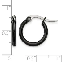 A pair of small black hoop earrings with a polished silver-tone inner surface, shown front and side view against a measurement scale.