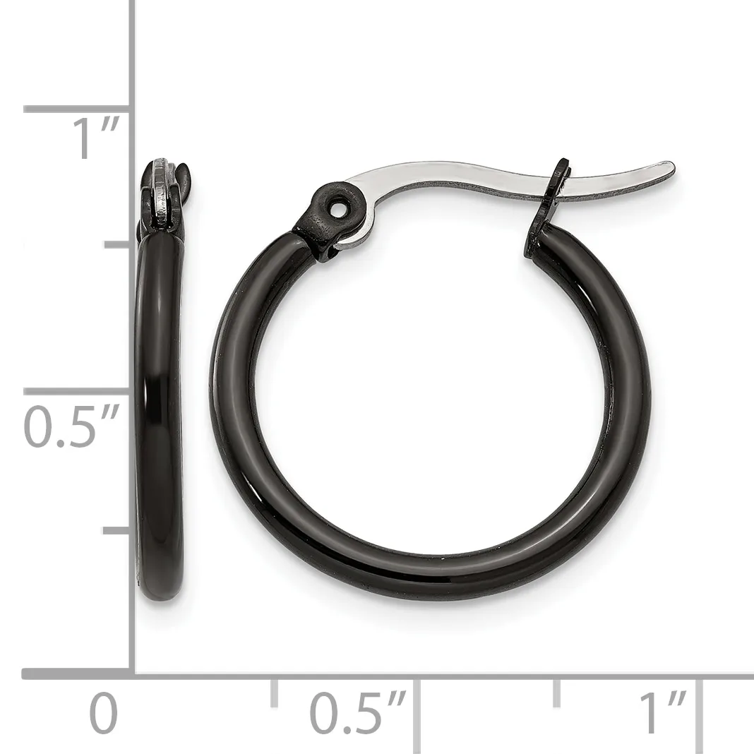 Black hoop earrings with a polished finish and hinged closures, displayed next to a measurement scale showing approximately one inch in diameter.