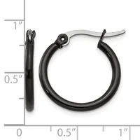 Black hoop earrings with a polished finish and hinged closures, displayed next to a measurement scale showing approximately one inch in diameter.
