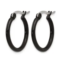 A pair of black hoop earrings with silver-toned hinged closures, displayed side by side against a white background.