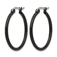 Pair of black hoop earrings with stainless steel posts and click-top closures, shown against a white background.