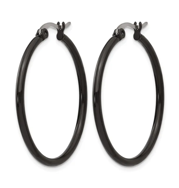 A pair of black polished hoop earrings with hinged closures displayed against a white background.
