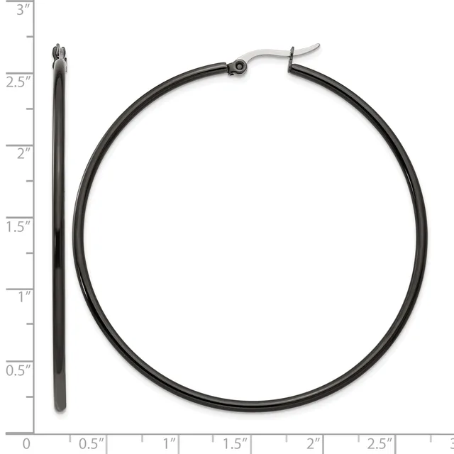 Black hoop earrings with a hinged closure, displayed next to a ruler showing one earring is approximately 2.5 inches long and the hoop diameter is about 2 inches.
