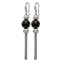 Pair of dangling earrings with polished silver and black spheres stacked vertically, suspended from silver hook closures with long mesh chain tassels.