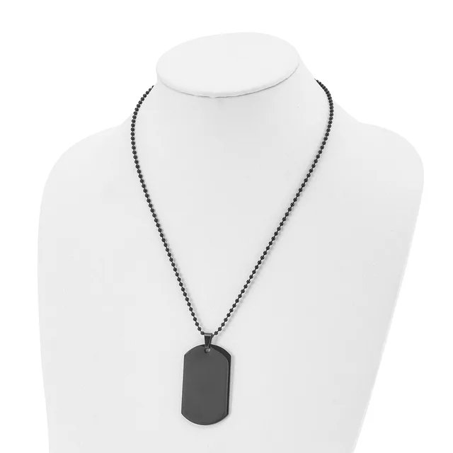 Black beaded chain necklace with a rectangular black dog tag pendant displayed on a white mannequin bust.