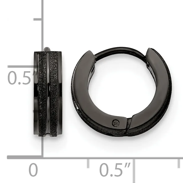 Two black textured huggie earrings shown front and side view against a measurement scale, approximately 0.5 inches in diameter.