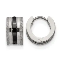 Two silver hoop earrings with textured surfaces and a black enamel stripe running through the center, shown from front and side views.