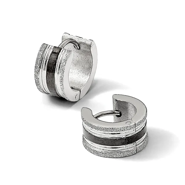 Pair of textured silver hoop earrings with dark striped inlay detail, shown from front and side angles.