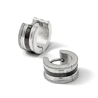 Pair of textured silver hoop earrings with dark striped inlay detail, shown from front and side angles.