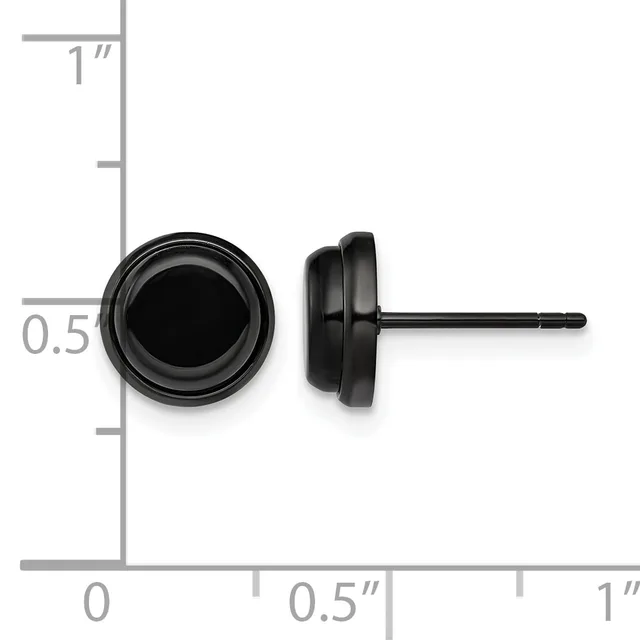 A pair of black stud earrings with circular faces and short posts, shown next to a ruler displaying measurements up to one inch.
