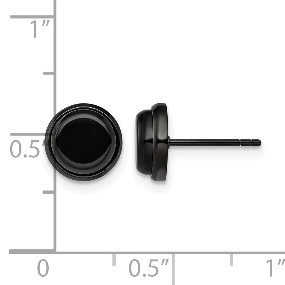 A pair of black stud earrings with circular faces and short posts, shown next to a ruler displaying measurements up to one inch.