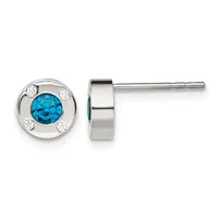 Pair of silver stud earrings with round faces featuring a central blue faceted stone surrounded by four small clear stones, shown from front and side views.
