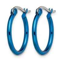 A pair of blue hoop earrings with a polished finish and silver-toned clip closures displayed against a white background.