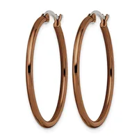 A pair of rose gold-toned hoop earrings with a polished finish and hinged closures, displayed against a white background.