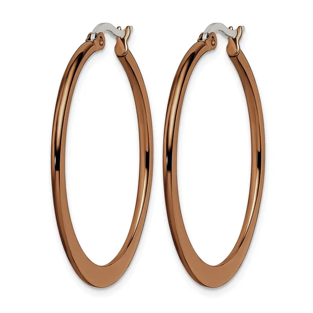 A pair of rose gold-toned hoop earrings with a polished finish and hinged closures, displayed against a white background.