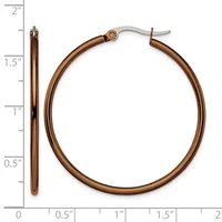 A pair of bronze-colored hoop earrings with a polished finish, shown next to a ruler indicating they measure approximately 1.75 inches in diameter.
