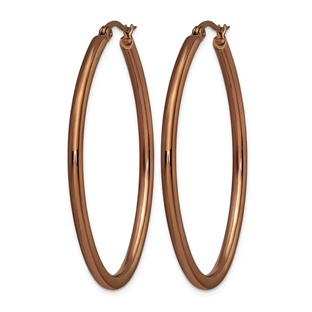 A pair of rose gold-toned oval hoop earrings with a polished finish and hinged clasp closures, displayed against a white background.