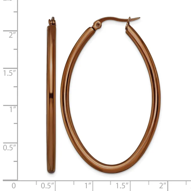 A pair of bronze-toned oval hoop earrings with a polished finish, shown front and side view against a measurement scale.