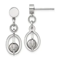Pair of sterling silver dangle earrings with polished disc studs, chain links, and oval frames each containing a brushed silver sphere.