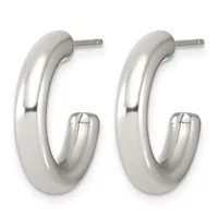 A pair of polished silver-tone chunky hoop earrings with post and clutch backs, displayed side by side.