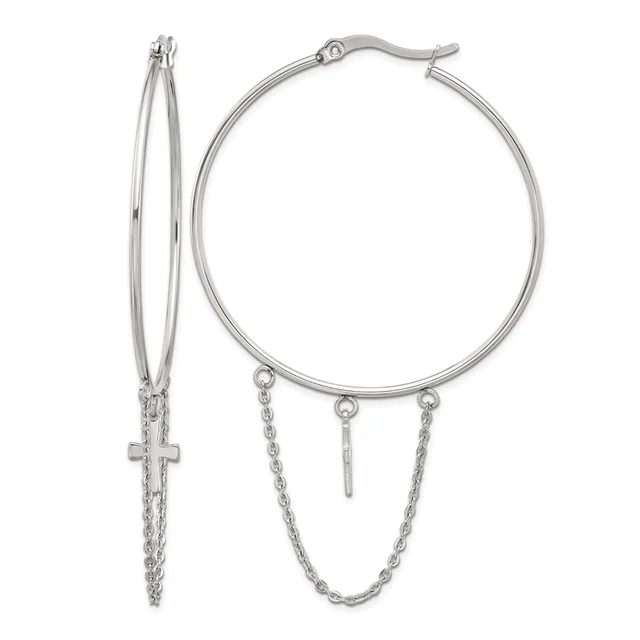 Pair of silver-toned hoop earrings with dangling chain details and small cross charm on one earring.