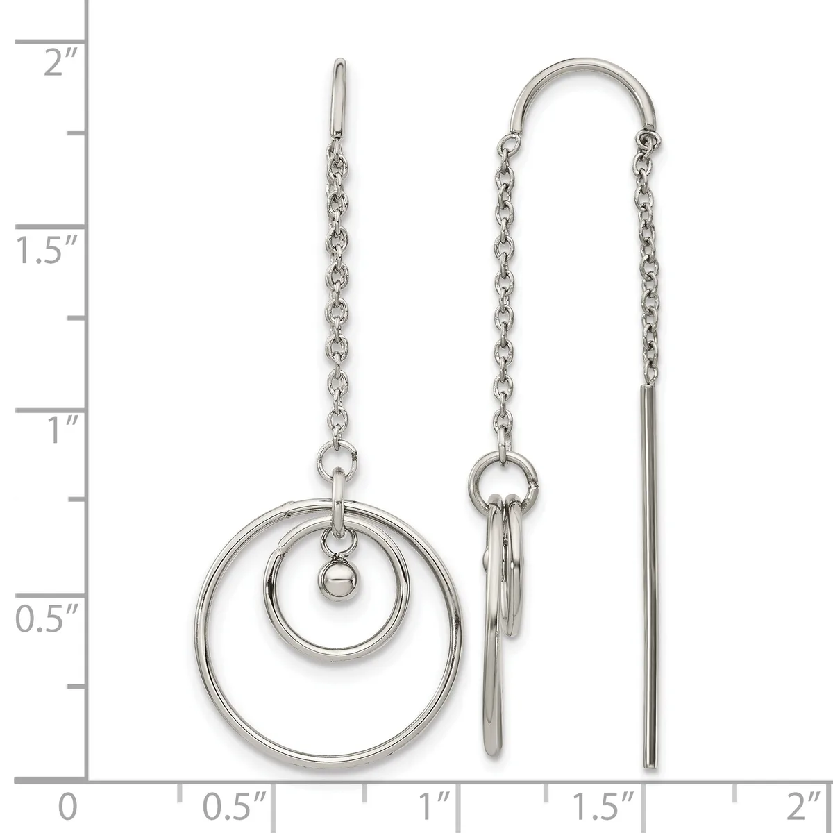 Pair of silver-toned chain earrings with concentric circle dangles on the left and threader style on the right, displayed against a ruler showing measurements up to two inches.
