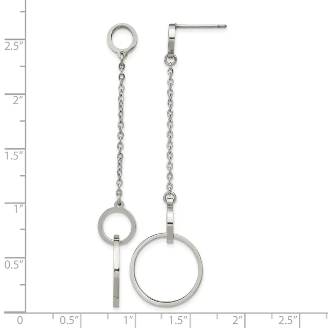A pair of asymmetrical silver-tone drop earrings with chain links and circular rings, displayed against a ruler showing measurements up to 2.5 inches.