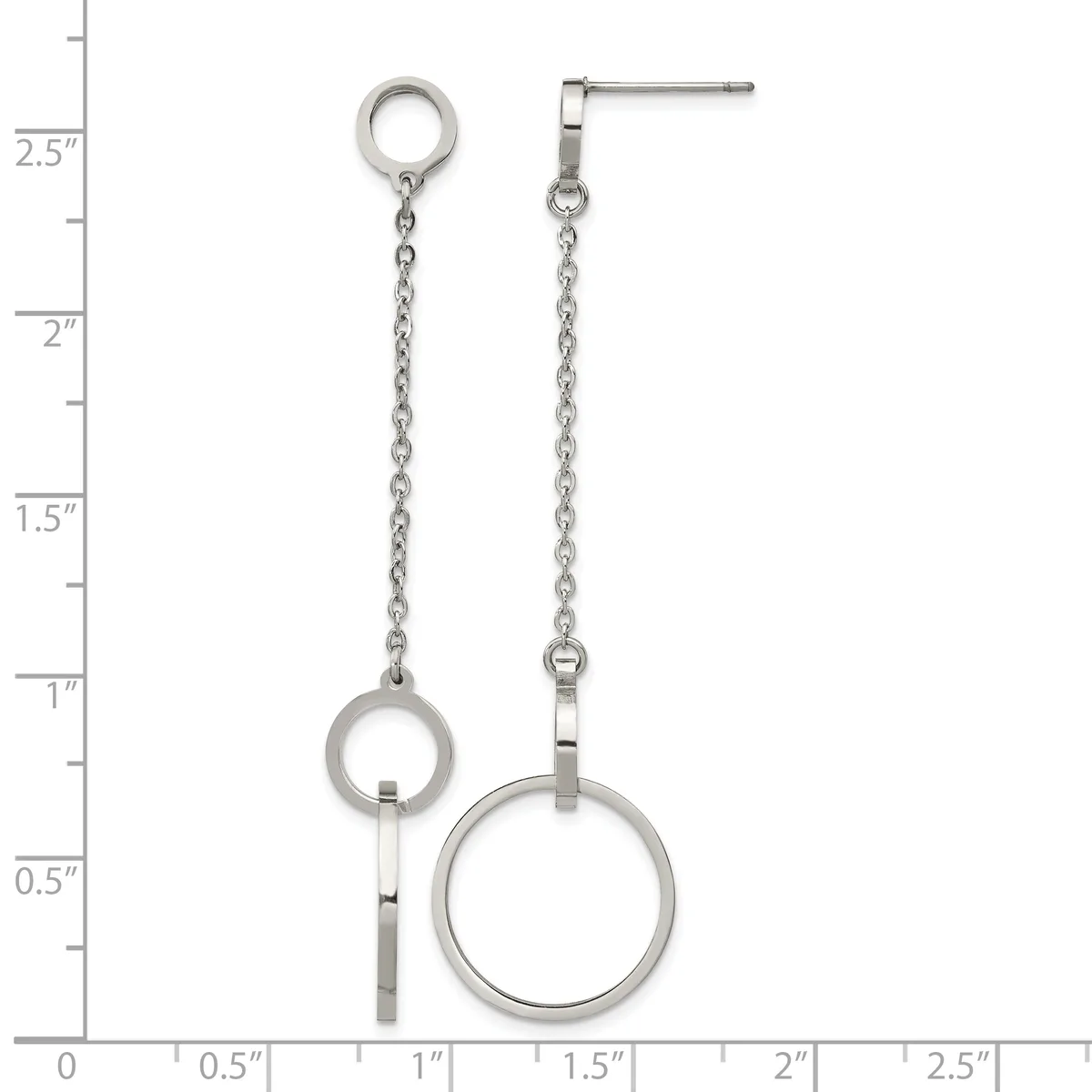 A pair of asymmetrical silver-tone drop earrings with chain links and circular rings, displayed against a ruler showing measurements up to 2.5 inches.