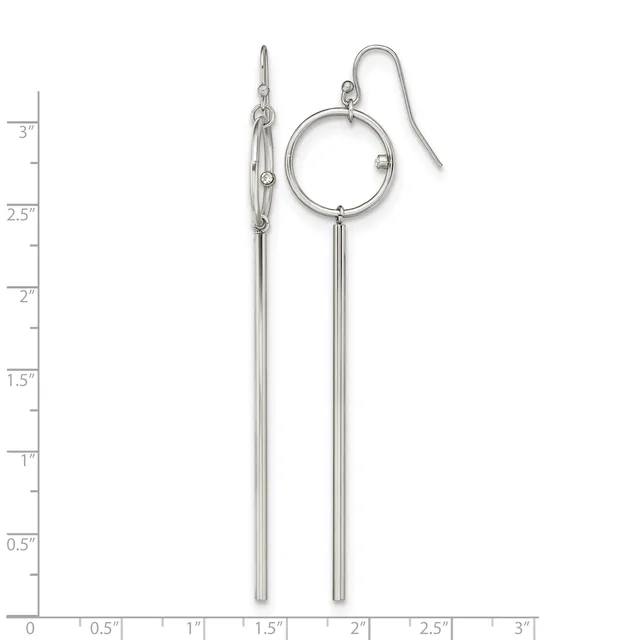 Pair of silver-tone earrings with circular tops connected to long tapered bar drops, displayed against a measurement ruler.