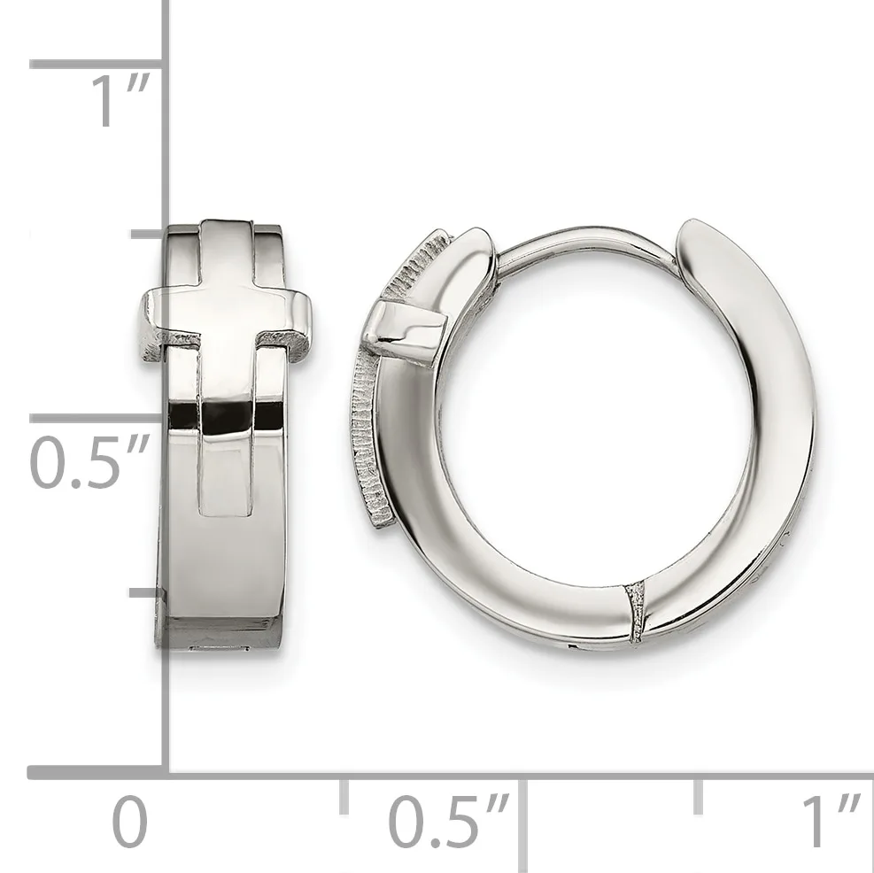 A pair of polished silver-toned hoop earrings with a cross motif on the front, shown from front and side views with a measurement scale indicating approximately one inch in diameter.