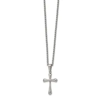 A silver-toned cross pendant hangs from a matching chain necklace against a white background.