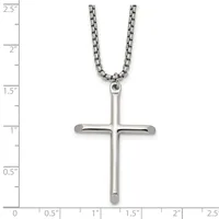 A polished silver cross pendant hanging from a box chain necklace, displayed against a ruler showing the cross is approximately one inch wide and two inches tall.