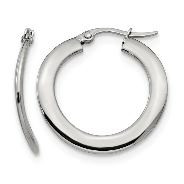 A pair of polished silver-toned hoop earrings with a thick tubular design and hinged closures, displayed against a white background.