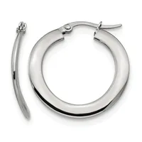 A pair of polished silver-toned hoop earrings with a thick tubular design and hinged closures, displayed against a white background.