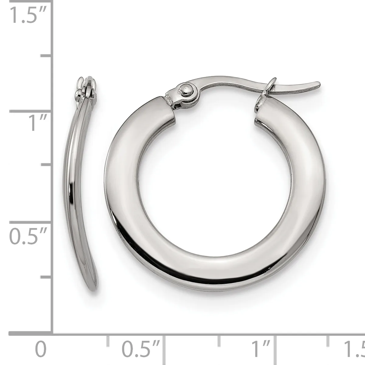 A pair of polished silver-toned hoop earrings with a chunky, rounded profile and clip-back closures, displayed against a ruler showing approximately 1 inch in diameter.