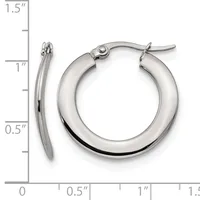 A pair of polished silver-toned hoop earrings with a chunky, rounded profile and clip-back closures, displayed against a ruler showing approximately 1 inch in diameter.