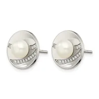 A pair of silver stud earrings featuring white pearls surrounded by curved silver settings accented with small diamonds arranged in a crescent pattern along the lower edge.