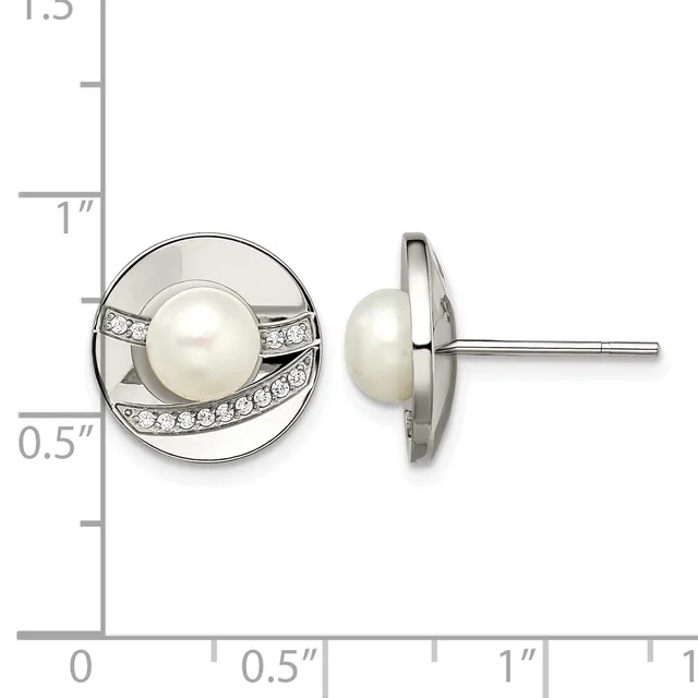 Pair of silver stud earrings featuring white pearl centers surrounded by diamond accents in circular settings, shown front and side view against a measurement scale.