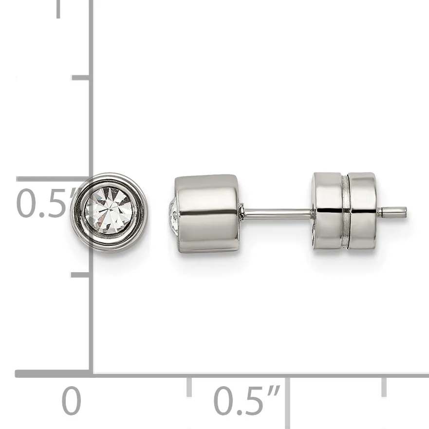 Stainless steel stud earrings with round bezels containing clear round stones, shown next to a ruler displaying their approximately 0.5-inch size.