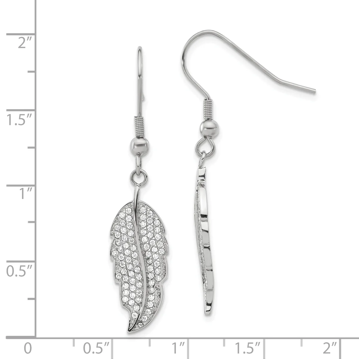 A pair of silver-toned fish hook earrings featuring leaf-shaped pendants paved with clear crystals, displayed against a measurement scale.