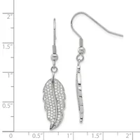 A pair of silver-toned fish hook earrings featuring leaf-shaped pendants paved with clear crystals, displayed against a measurement scale.