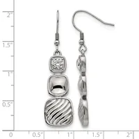 A pair of silver-toned dangle earrings with three stacked square charms: a faceted crystal top, polished middle section, and diagonal striped bottom, shown against a measurement ruler.