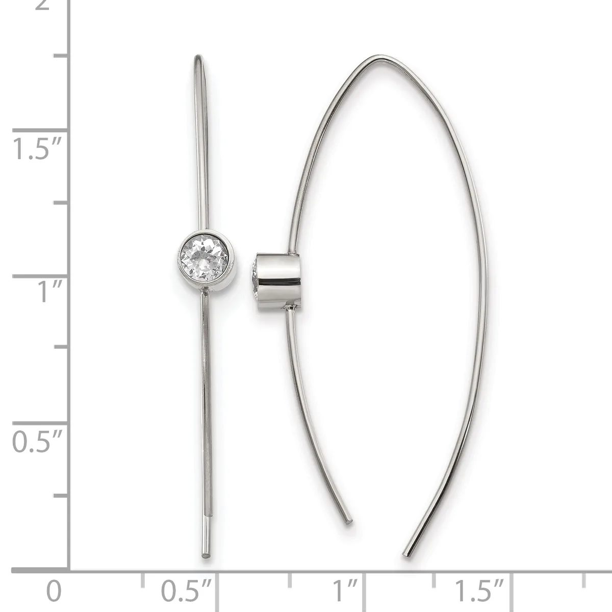 Two silver earrings displayed against a ruler showing measurements up to 2 inches: one linear drop earring with a round faceted stone at top, and one curved open hoop earring with a cylindrical connector.