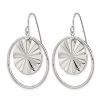 Pair of silver drop earrings with oval outer rings and circular inner discs featuring radiating line patterns, suspended from wire hooks.