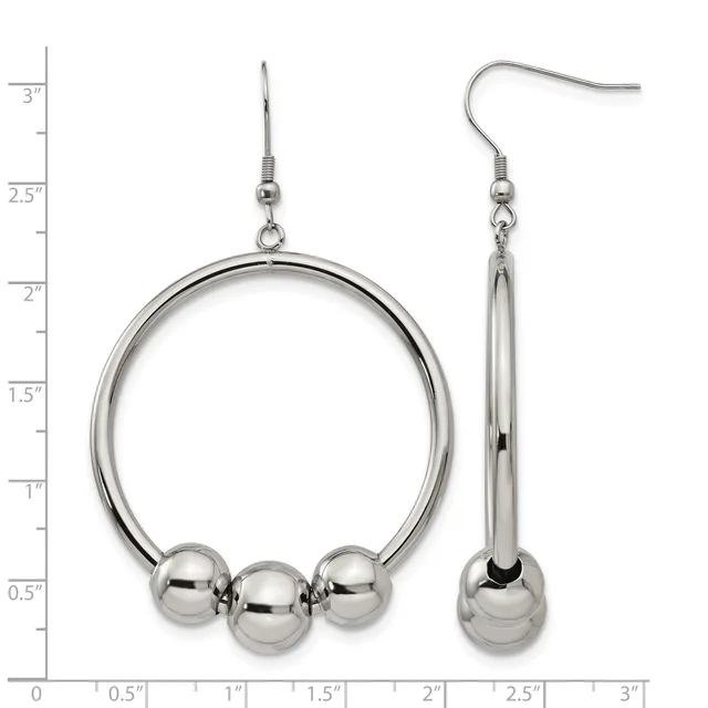 A pair of stainless steel earrings with a measurement scale: the left earring features a large hoop with three dangling spheres at the bottom, and the right earring is a single elongated sphere on a thin stem, both suspended from fishhook wires.