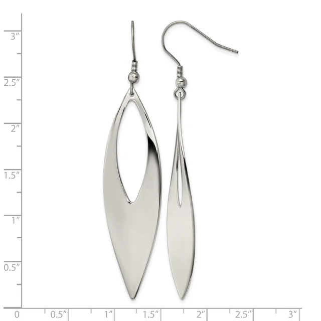 A pair of silver-toned drop earrings with elongated oval shapes and cutout centers, displayed against a measurement scale.
