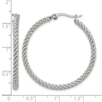 Silver-toned twisted rope hoop earrings with French wire posts, shown at actual size with a measurement scale indicating approximately 1.5 inches in length.