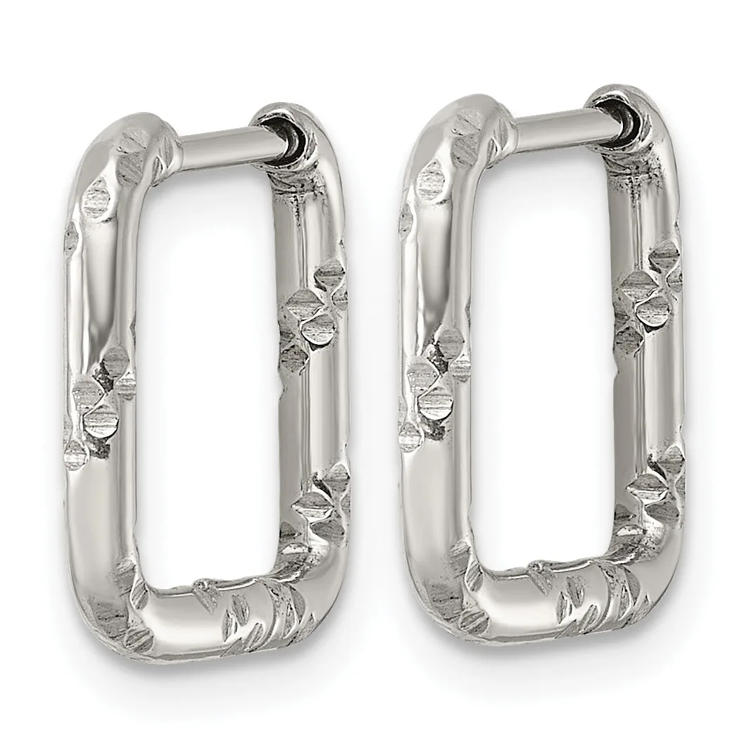 A pair of silver rectangular hoop earrings with textured, hammered surfaces and hinged closures, displayed against a white background.