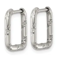 A pair of silver rectangular hoop earrings with textured, hammered surfaces and hinged closures, displayed against a white background.